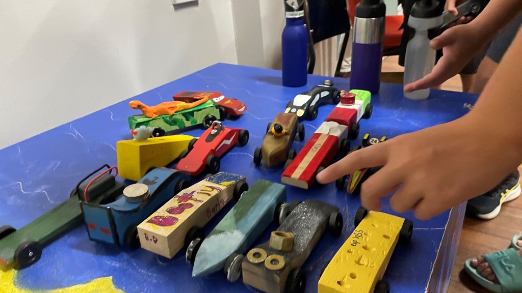 Picture depicting wooden racing cars made by 1st Leichhardt Scouts